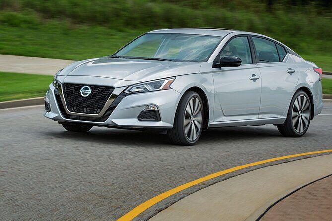 Private Car with English Speaking Driver - Comfort details that matter: Nissan Altima, air-conditioning, and a driver who talks